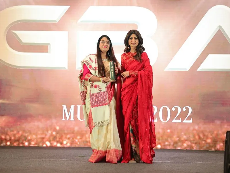 PLANCARE receiving Global Excellence Award from Shilpa Shetty