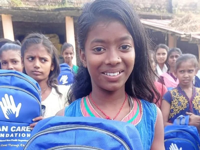 Children with new school bags donated by PlanCare in Jharkhand